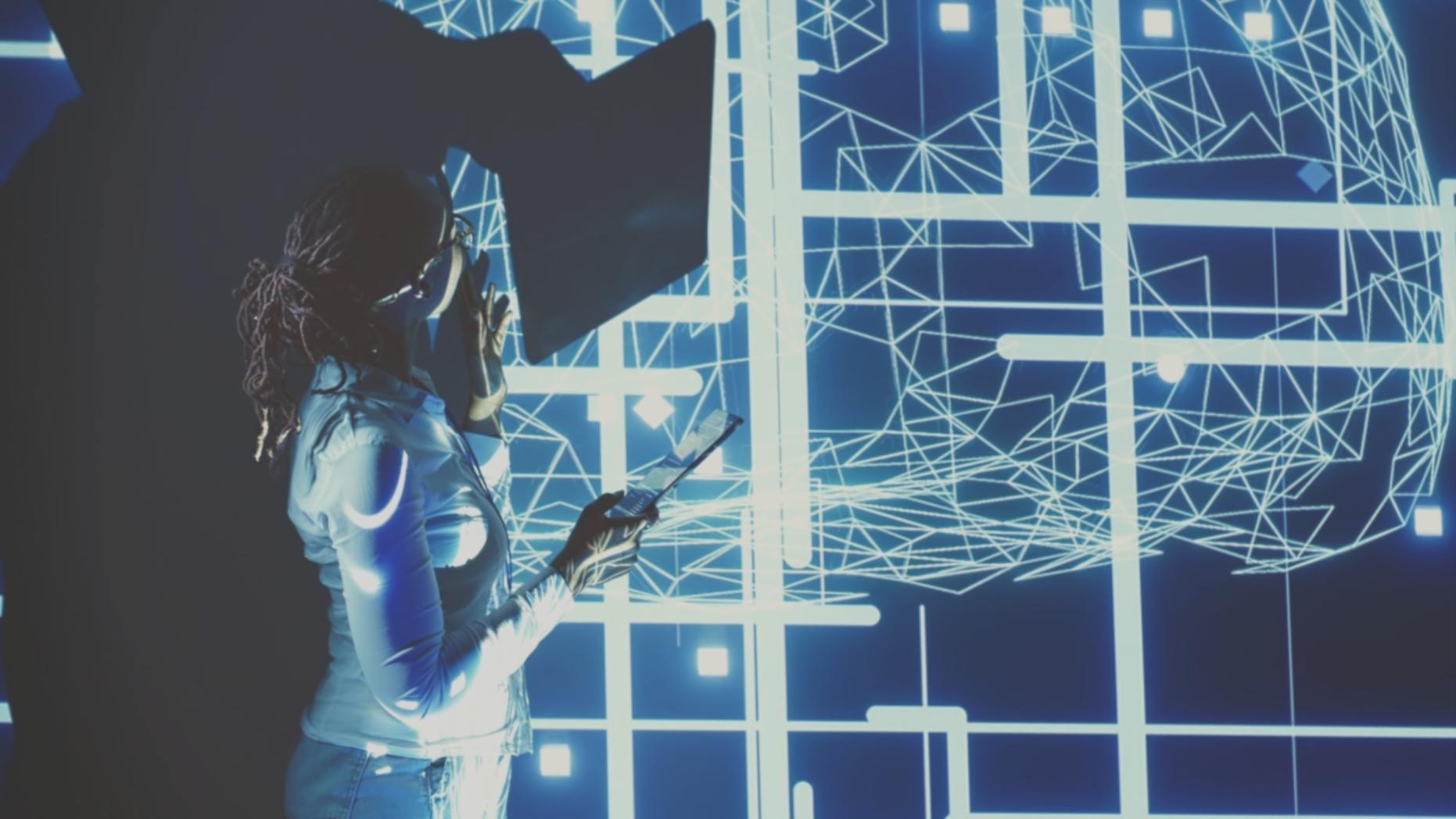 Instructor reviewing performance analysis on monitoring screen